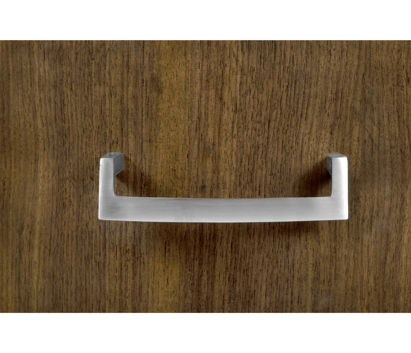 Oval chest of drawers in American walnut