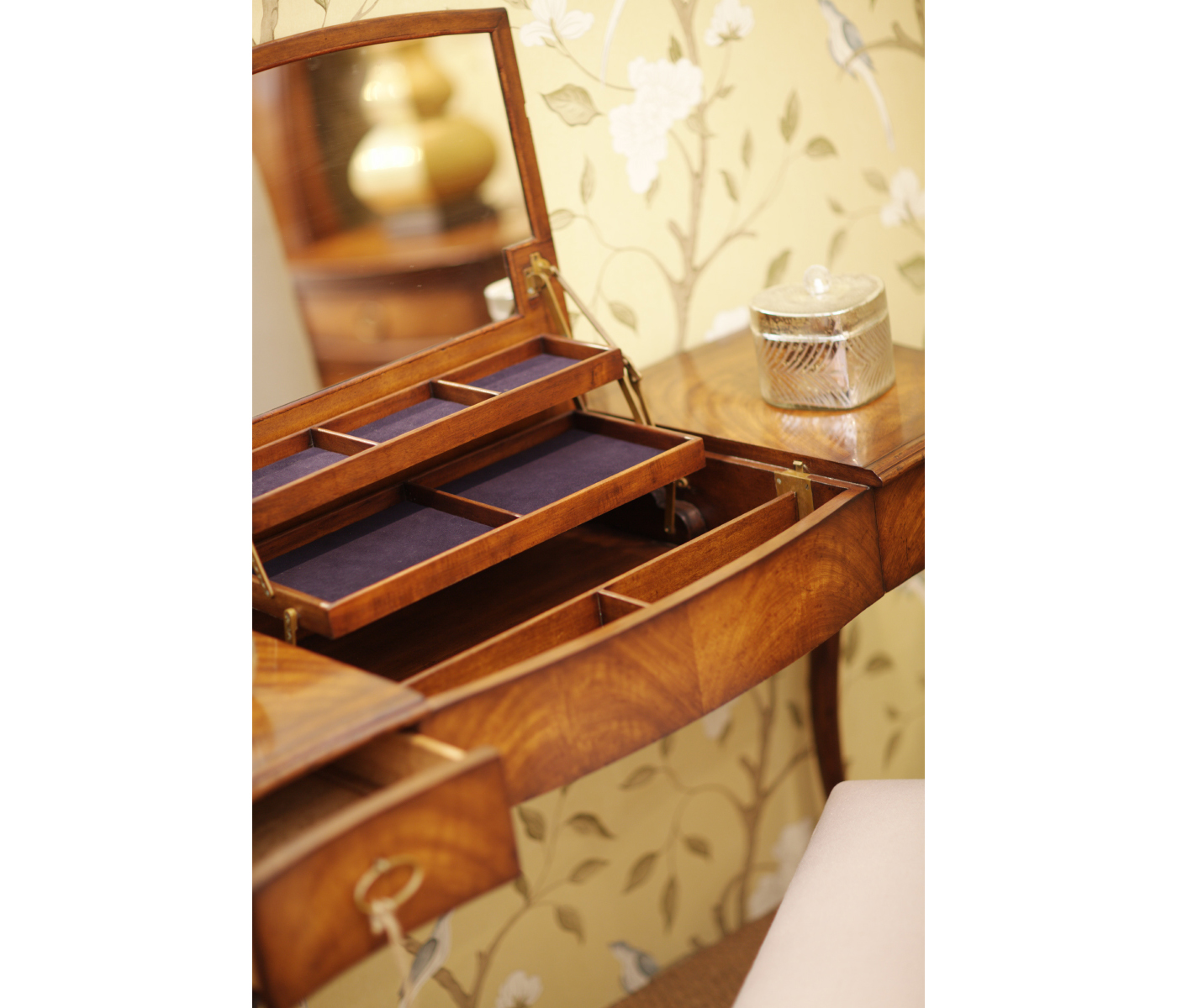 Dressing table with hinged mirror