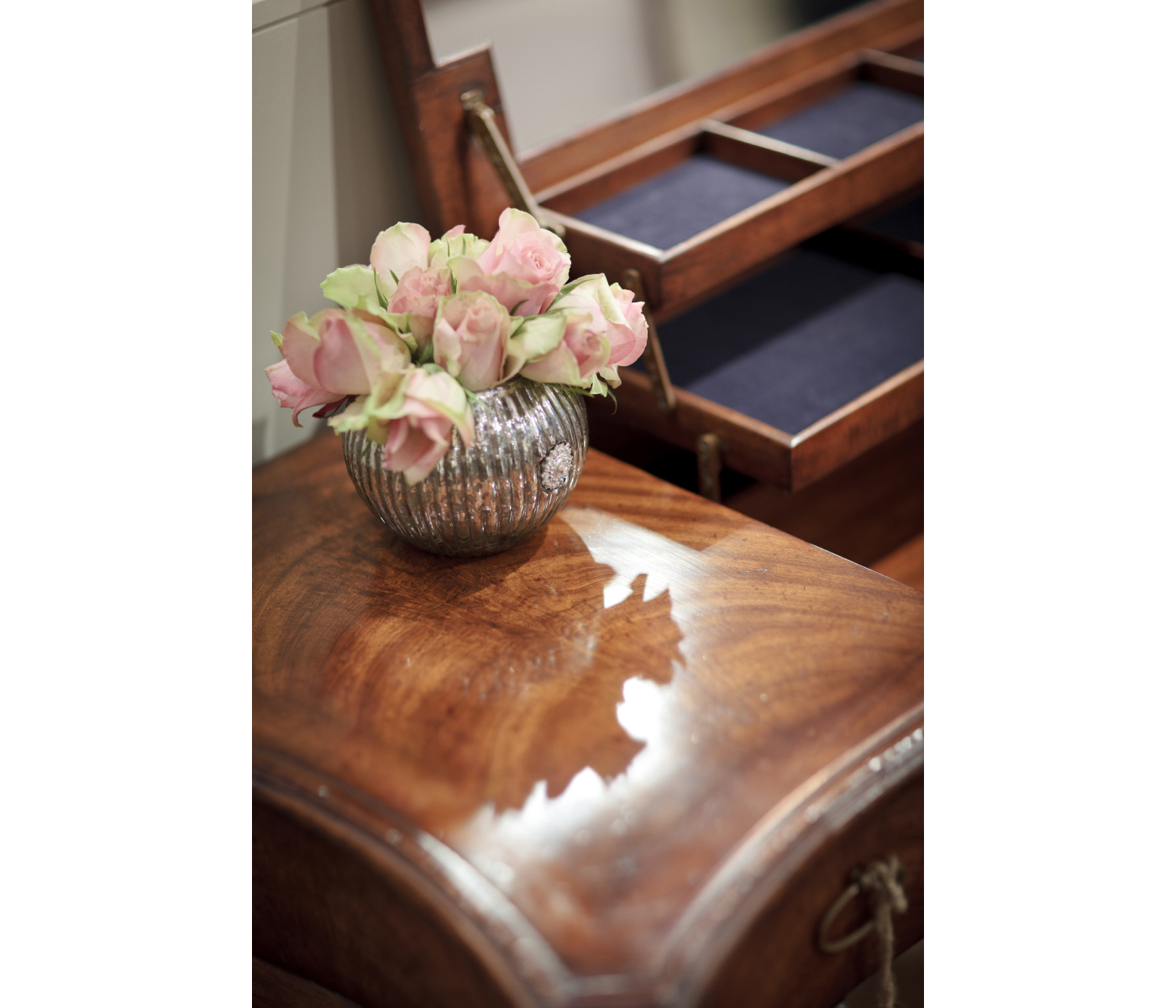Dressing table with hinged mirror