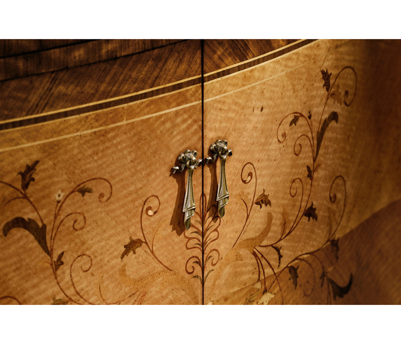 Satinwood serpentine sideboard with floral inlay